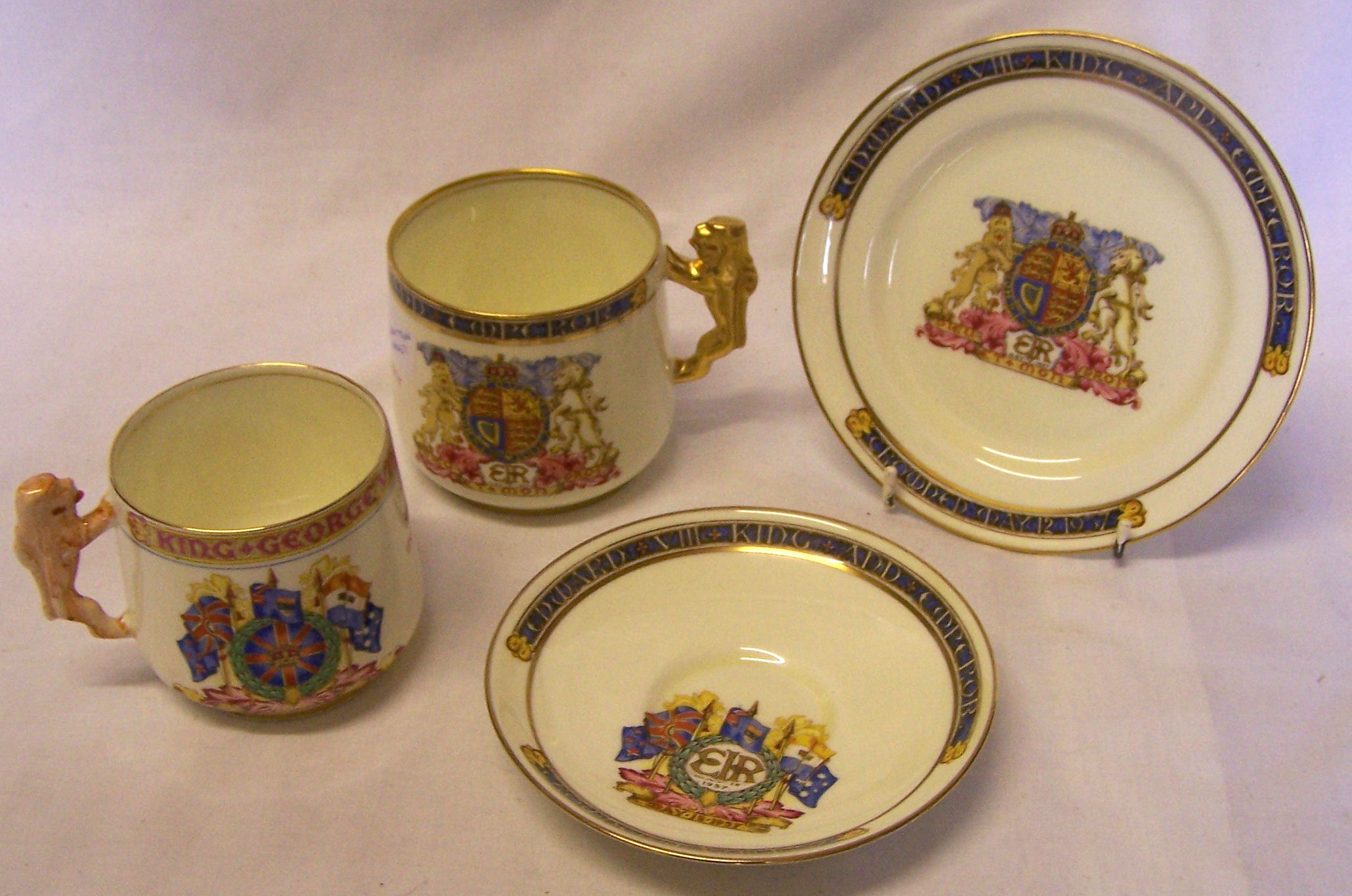 A Paragon Cup, Saucer and Plate commemorating the Coronation of Edward VIII and a similar George VI