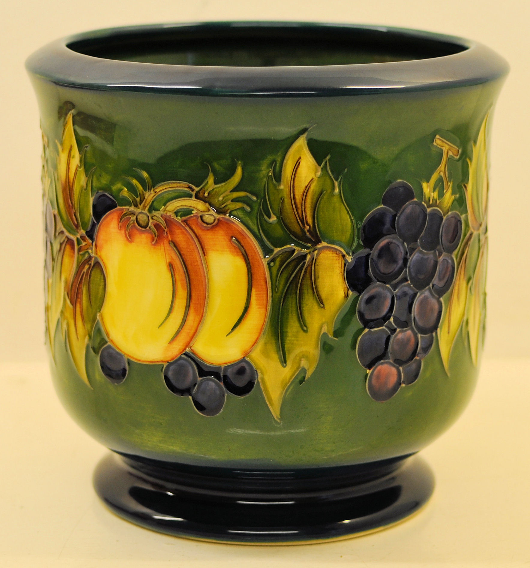 A Moorcroft, limited edition, Jardiniere decorated in the fruit and vine pattern, designed by