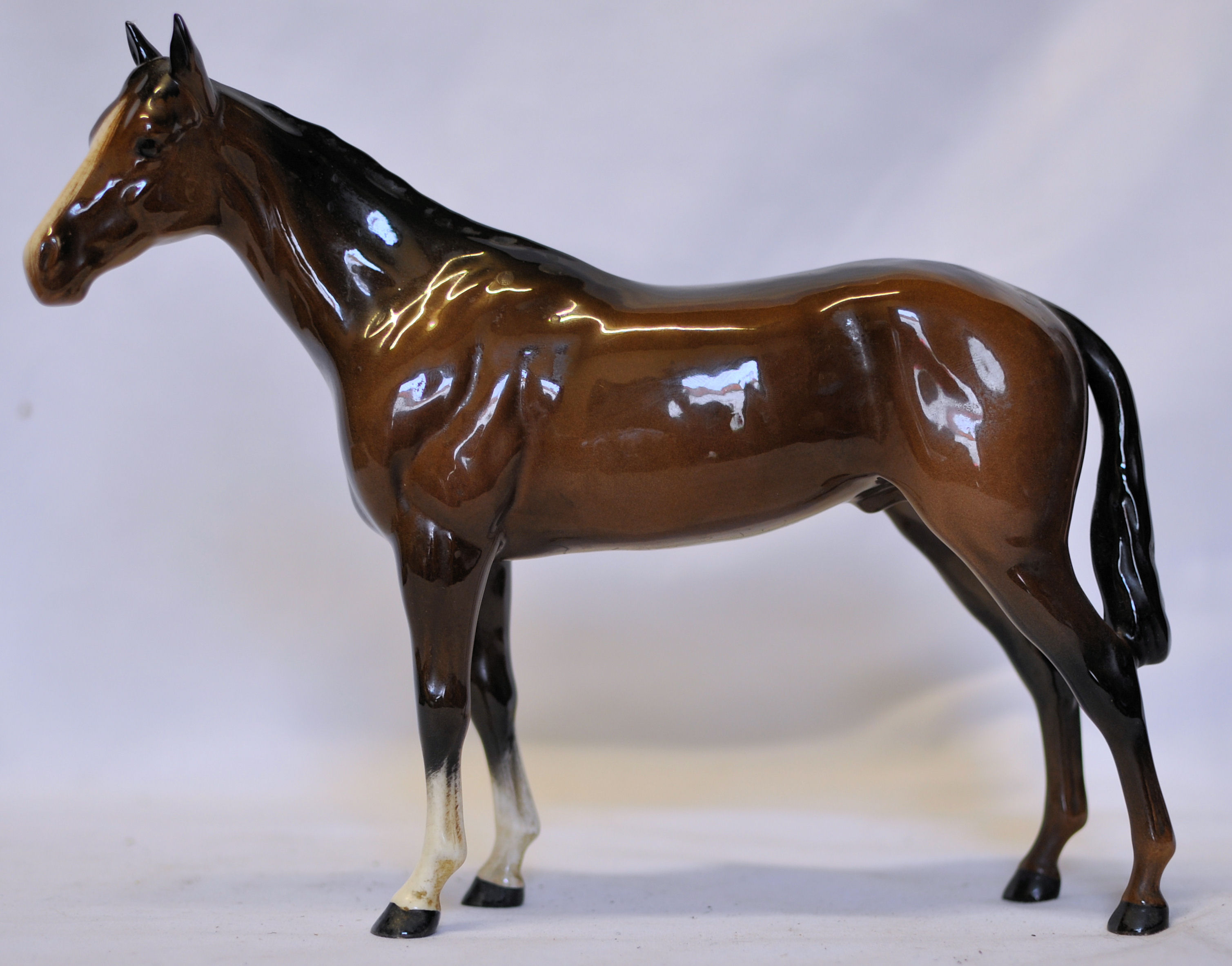 A Beswick model of a brown Racehorse, no. 701, 2nd version.