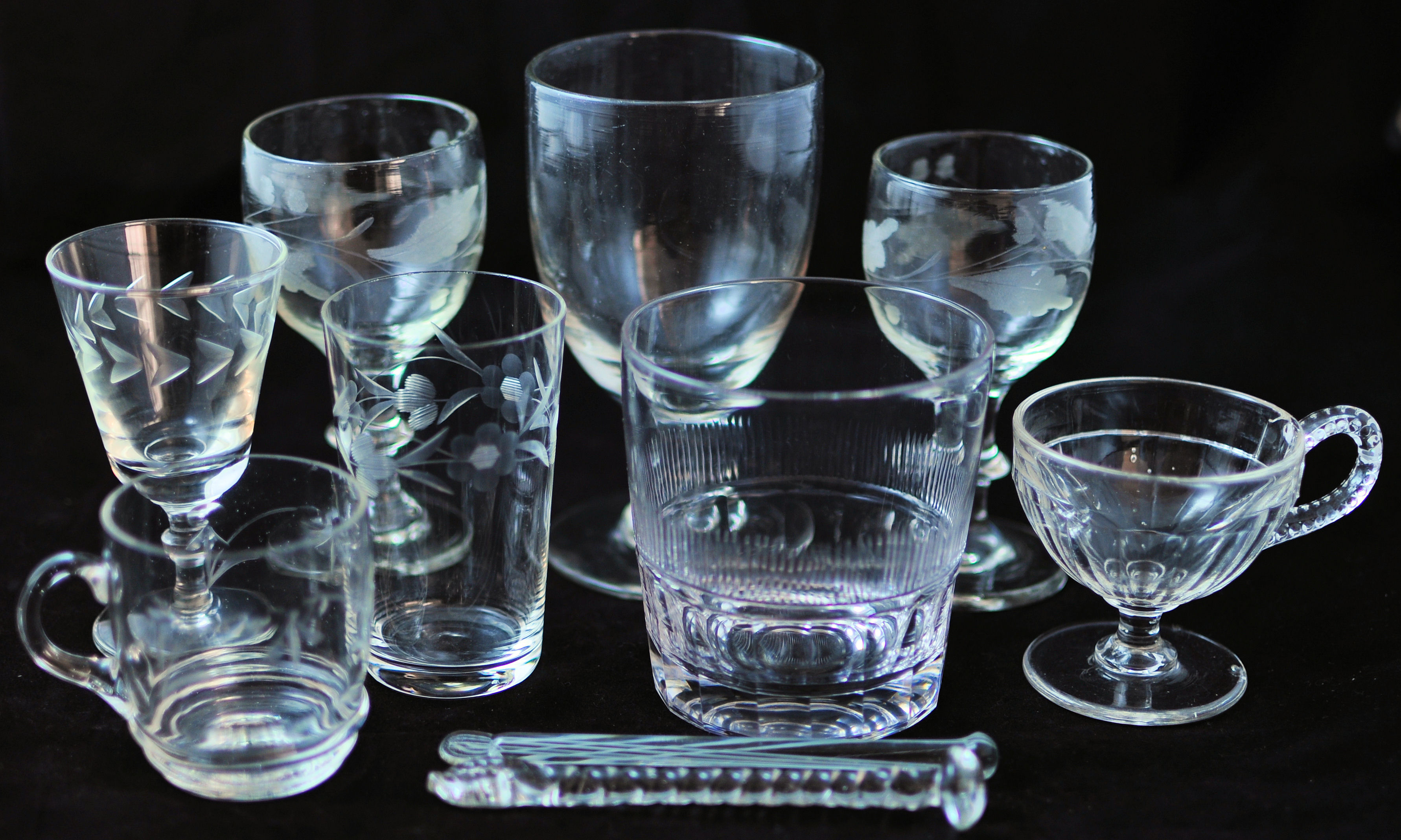 A near pair of 19th Century Wine Glasses with etched decoration and cushion knop stem, two glass