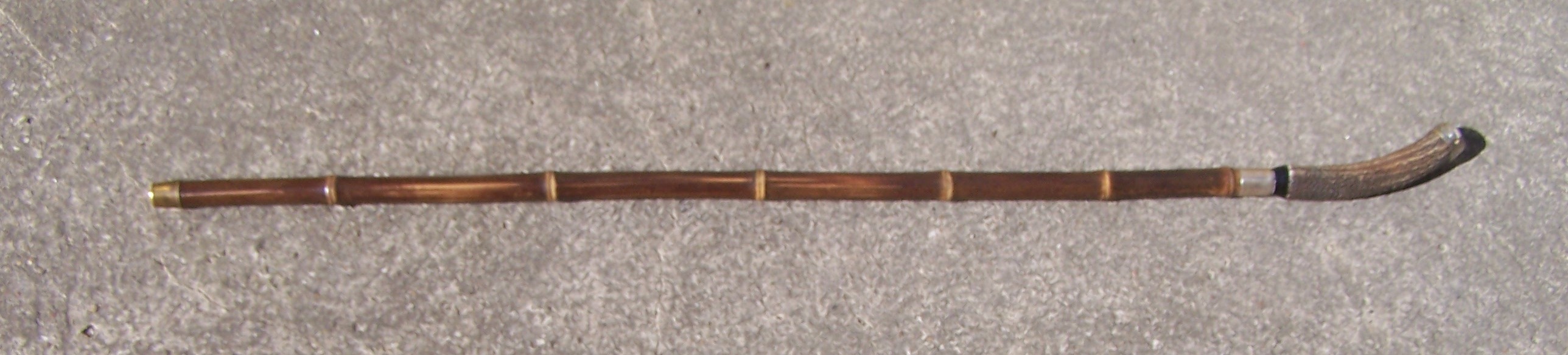 A Sword Stick in bamboo scabbard and antler handle.