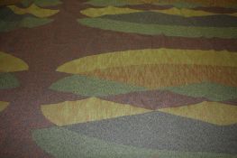 Two large rolls of Edinburgh Weavers fabric `Amborna` on brown ground with geometric oval pattern.