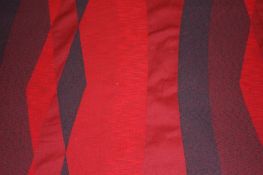 Three lengths of Edinburgh Weavers fabric `Amborna` pattern on a red ground with geometric oval