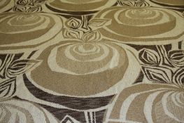 A roll of Edinburgh Weavers fabric `Orongo` pattern on a natural brown coloured ground. 40m