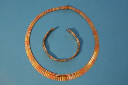 A 9ct gold tri-colour necklace and a bracelet. Weight 44.9 grams