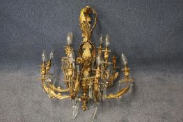 A pair of glass 6 branch chandeliers and a metalwork chandelier.44 cm high