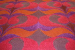A roll of fabric Edinburgh Weavers `Taco` pattern, decorated with rows of geometric pattern. 37m