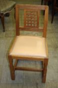 A set of six Robert "Mouseman" Thompson of Kilburn chairs with lattice work backs, overstuffed seats