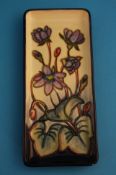 A Moorcroft "Hepatica" oblong pen tray designed by Emma Bossons, impressed marks. 20 cm long