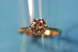 An 18ct gold solitaire diamond ring, round cut, approx. 1.25 cts and colour H.