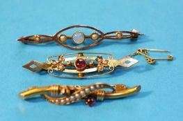 A 15ct gold seed pearl and ruby brooch, a 9ct gold opal and seed pearl brooch and a 9ct gold brooch.