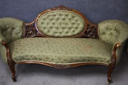 A Victorian walnut saloon suite comprising settee, two nursing chairs and four single chairs.