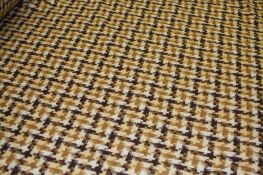 A large roll of woven wool fabric of brown chequered pattern. Approx. 30m