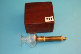 A Victorian medical leech pump in a small mahogany box, having a glass bowl and brass pump. 18 cm