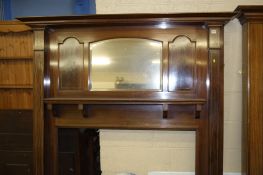 An Edwardian mahogany mirror backed fire surround. 150 cm wide