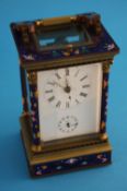 A modern cloisonne carriage clock with enamelled dial and subsidiary dial. 16 cm high