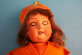 A German doll, Gebruder and Heubach, bisque head with weighted eyes and open mouth, stamped 8192.
