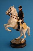 A Beswick model Lipizzaner and rider, first version, printed mark and label, number 2467.