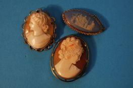 Two Victorian oval Cameo brooches and a Wedgwood jasperware 9ct gold mounted brooch. (3)