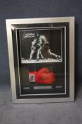 A signed framed boxing glove and signed photograph by Jake LaMotta "Raging Bull" limited edition (