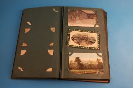 An album of old postcards including many World War I interest cards.