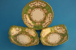 A set of 6 Royal Crown Derby plates on an apple green ground highlighted in gilt and a matching pair