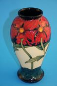 A Moorcroft "Band of Daisies" pattern baluster shape vase, printed marks. 26 cm high