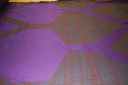A large roll of Edinburgh Weavers `Karima` pattern woven fabric with stylised purple leaf pattern on