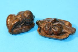 Two carved wood netsuke, a mermaid and a fish with an octopus on top. (3)