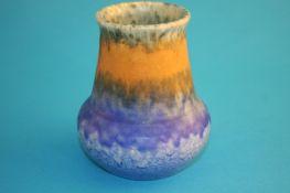 A Ruskin pottery Souffle glazed vase by William Howson Taylor, decorated in oranges and blues,