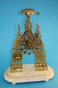 A 19th century brass skeleton clock by M. Horsley of Hartlepool, supported on a stepped marble base.