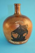 A Doulton Lambeth stoneware flask "Special Highland Whisky", impressed mark numbered 4818. 19 cm