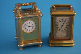 Two modern miniature carriage clocks. Each 7.5 cm high