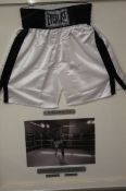 A pair of signed boxing shorts, signed by Muhammad Ali "Sports Personality of the Century",
