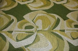 A roll of Edinburgh Weavers `Kabani` pattern woven fabric with yellow and green stylized flowers and