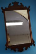 A mahogany Chippendale style wall mirror. 70 cm x 43 cm overall size