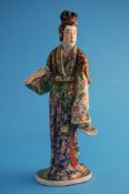 A Japanese Bijin style figure of a lady. 36 cm high