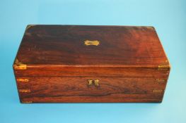 A Victorian rosewood and brass bound writing slope. 50 cm wide