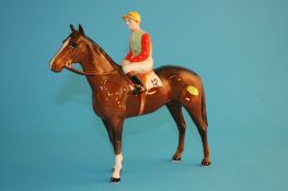 A Beswick horse and jockey, printed mark, number 1862, in brown.