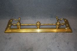 A late Victorian ornate brass fender. 140 cm long 40 cm deep
