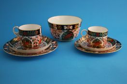 A Crown Derby Imari part tea set comprising 6 side plates, 4 saucers and 2 cups; and a Royal Crown