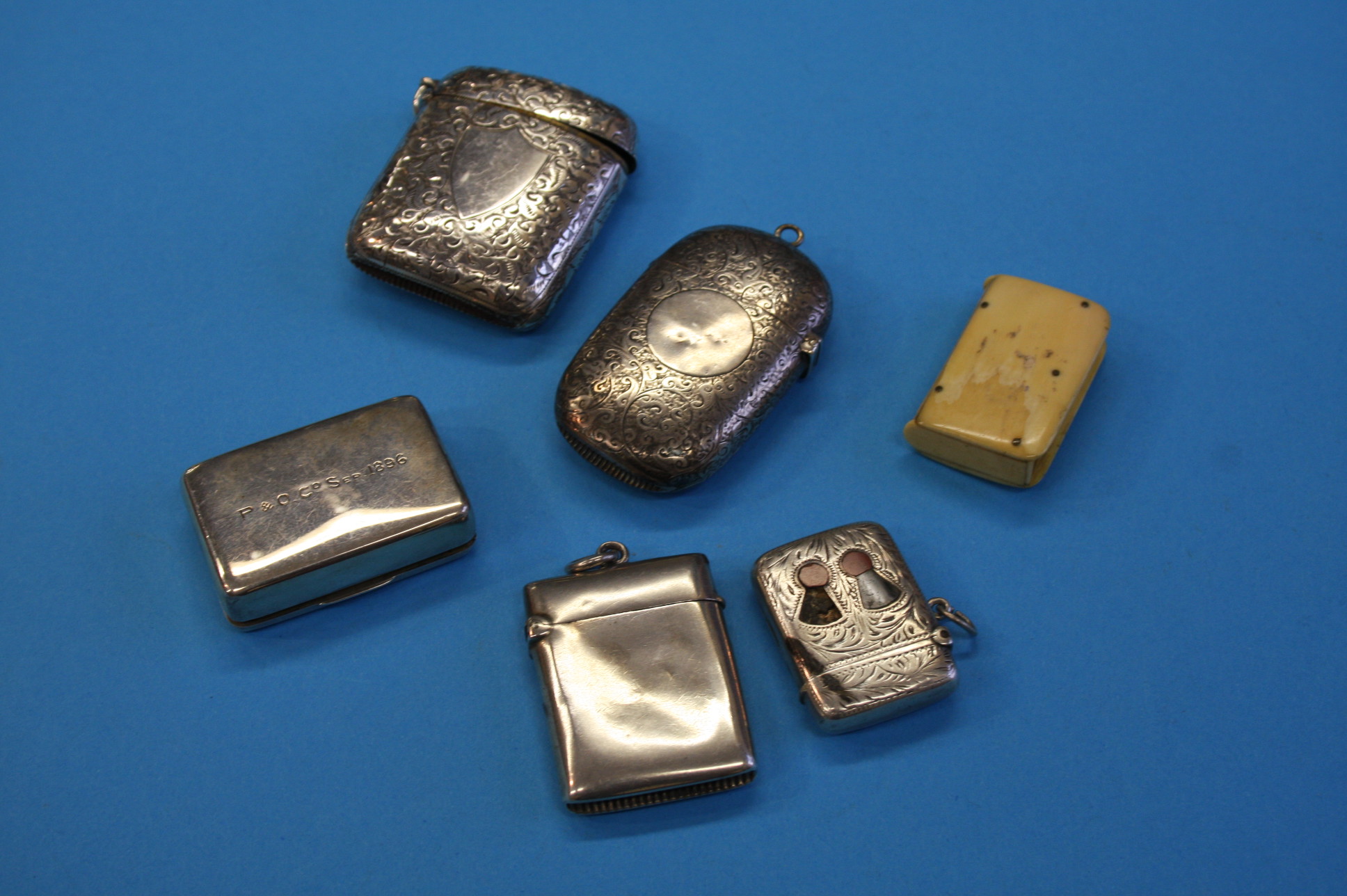 Five various silver vesta cases including one stamped "SS India P&O Co September 1896, London 1896"