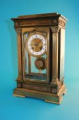 A late 19th century French mantle clock, the movement stamped Rack A1360, with enamelled circular