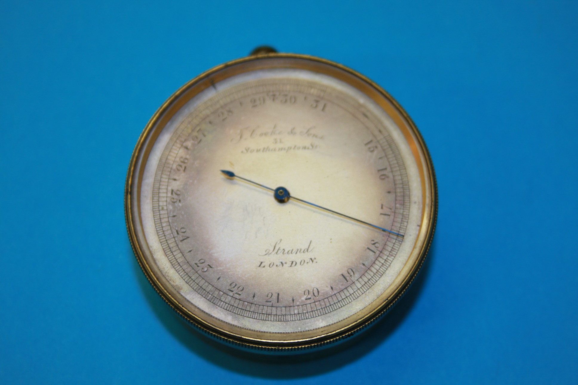 A gilt metal pocket gauge, T Cooke & Sons, 31 Southampton Street, Strand, London.4.5 cm diameter - Image 2 of 2