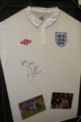 A signed England football shirt autographed by Darren Bent and framed Sunderland goalkeeper`s