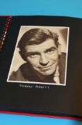 A collection of 63 signed photos, cards and album pages including Fred Macmurray, Shelley Winters,