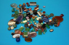 A large quantity of semi precious stones including agates.