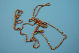 A 9ct gold long chain. Weight 25.2 grams