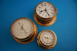 A brass circular ship`s clock by Thomas Gunn of Aberdeen; a Thomas Gunn brass ship`s barometer and