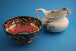 A Cetem ware wash jug decorated with cockerels; and a Maling "Floral border, rose" pattern circular